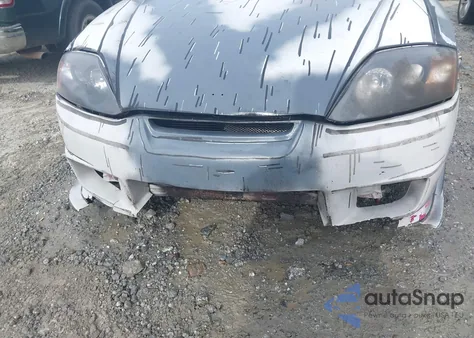 2005 Hyundai Tiburon Gt/Se z USA, uszkodzony, nr VIN KMHHN65F95U167571